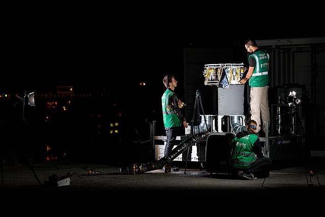 Team of two men working on the GATE Space propulsion system